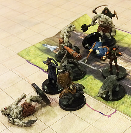 Gnolls and adventurers battle to the death (D&D miniatures)