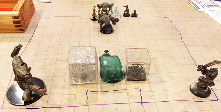 A clay Golem greets the Heroes as they enter The Professor's lab (D&D minis)