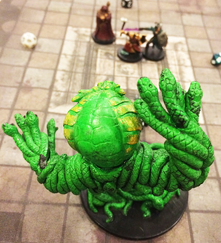 View of the Heroes from the giant snake monster (Dungeons and Dragons miniatures)