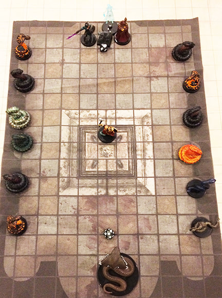 Garrus rushes into the center of battle against snakes (D&D miniatures)