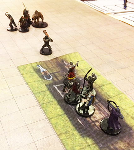 Soldiers confront the rest of the adventuring party (D&D minis)