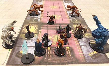 D&D hero minis in a main room with monsters in side rooms.