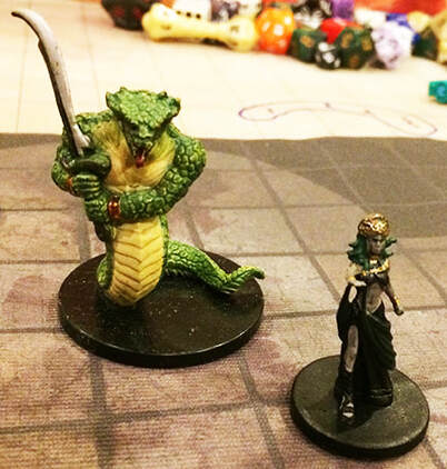 El Kah and his cleric stand ready to fight (D&D minis)