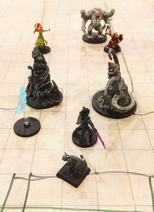 Wanda the ghost tries to distract Ropers (D&D miniatures)