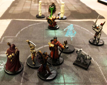Everyone watches from the back as a lich blocks their path.