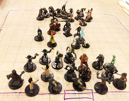 A room full of zombies encircle The Heroes (D&D miniatures)