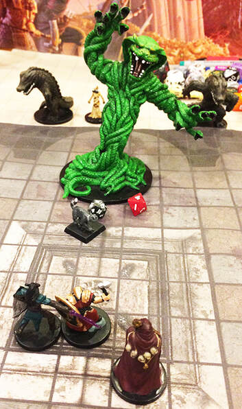 El Kah turns into a giant snake monster (D&D minis)