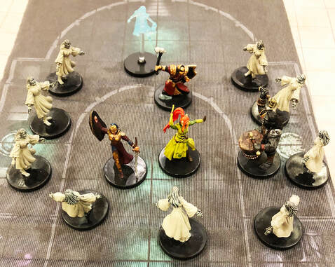 Garrus and Amidaeus are surrounded by vampire brides. (D&D miniatures)