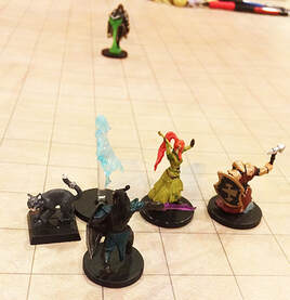 Garrus, Wanda, Amidaeus, and Lupin face a Lich (D&D miniatures)