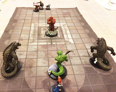 El Kah faces off against Zuul the demon (Dungeons and Dragons minis)