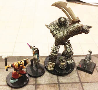Garrus, Lupin, and the Professor watch the coming battle. (D&D miniatures)