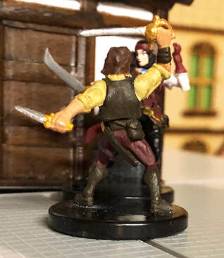 A closeup of the duel. (dungeons and dragons miniatures)