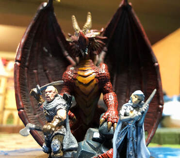 Characters posing in front of a dragon.